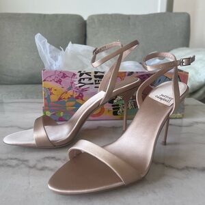 Jeffrey Campbell “Blossmz Ankle Strap” heel in Champagne Satin